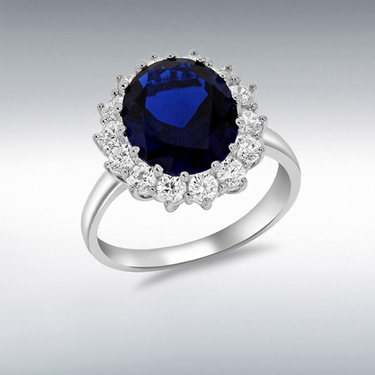 STERLING SILVER RHODIUM PLATED BLUE AND WHITE CZ CLUSTER RING